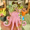 Thumbnail: A cute small pink Octopus potted with colourful succulents
