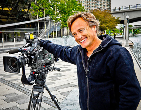 Joel Haslam portrait with camera