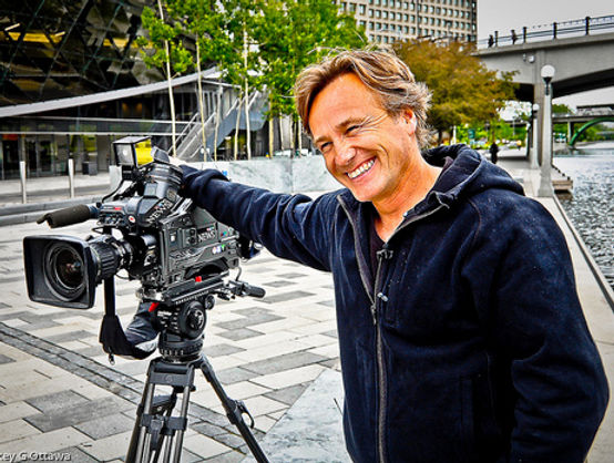 Joel Haslam portrait with camera