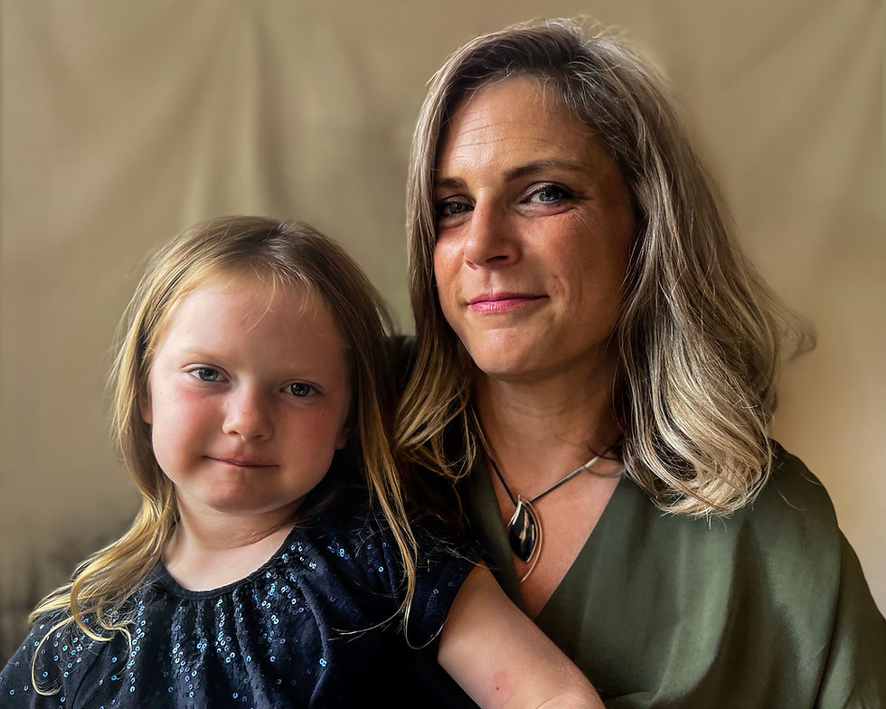 Selected photographic reference of a mother and daughter for an oil portrait commission.