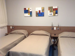 Apto triplo Total Hotel