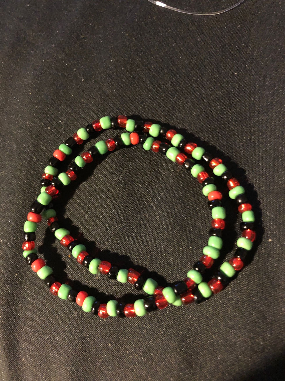 Thumbnail: Red Black and Green stretch bracelets 