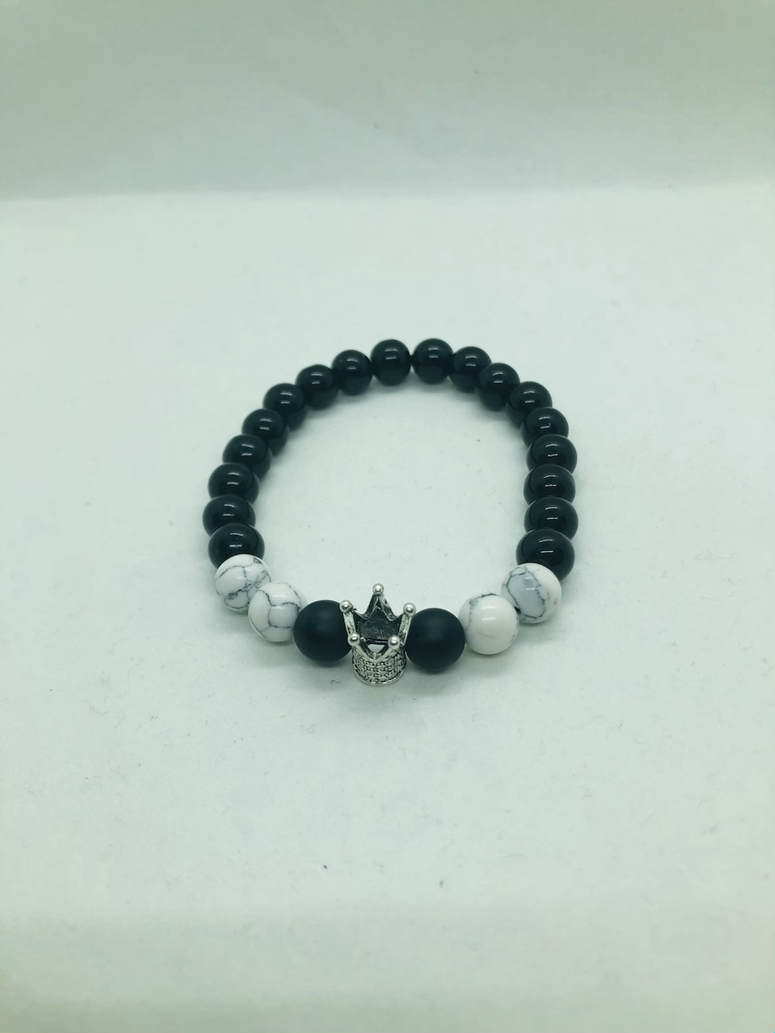 Crowned Howlet and Obsidian Bracelet