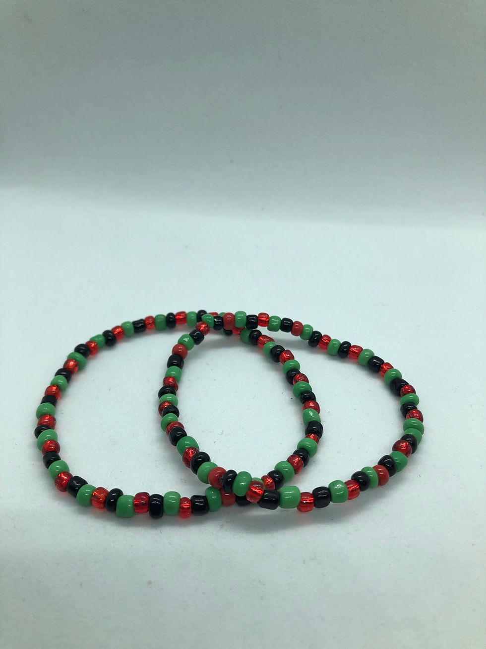 Thumbnail: Red Black and Green stretch bracelets 