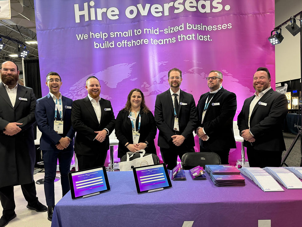 Group photo of Slash Staffing team at the OJBA 2025 Expo