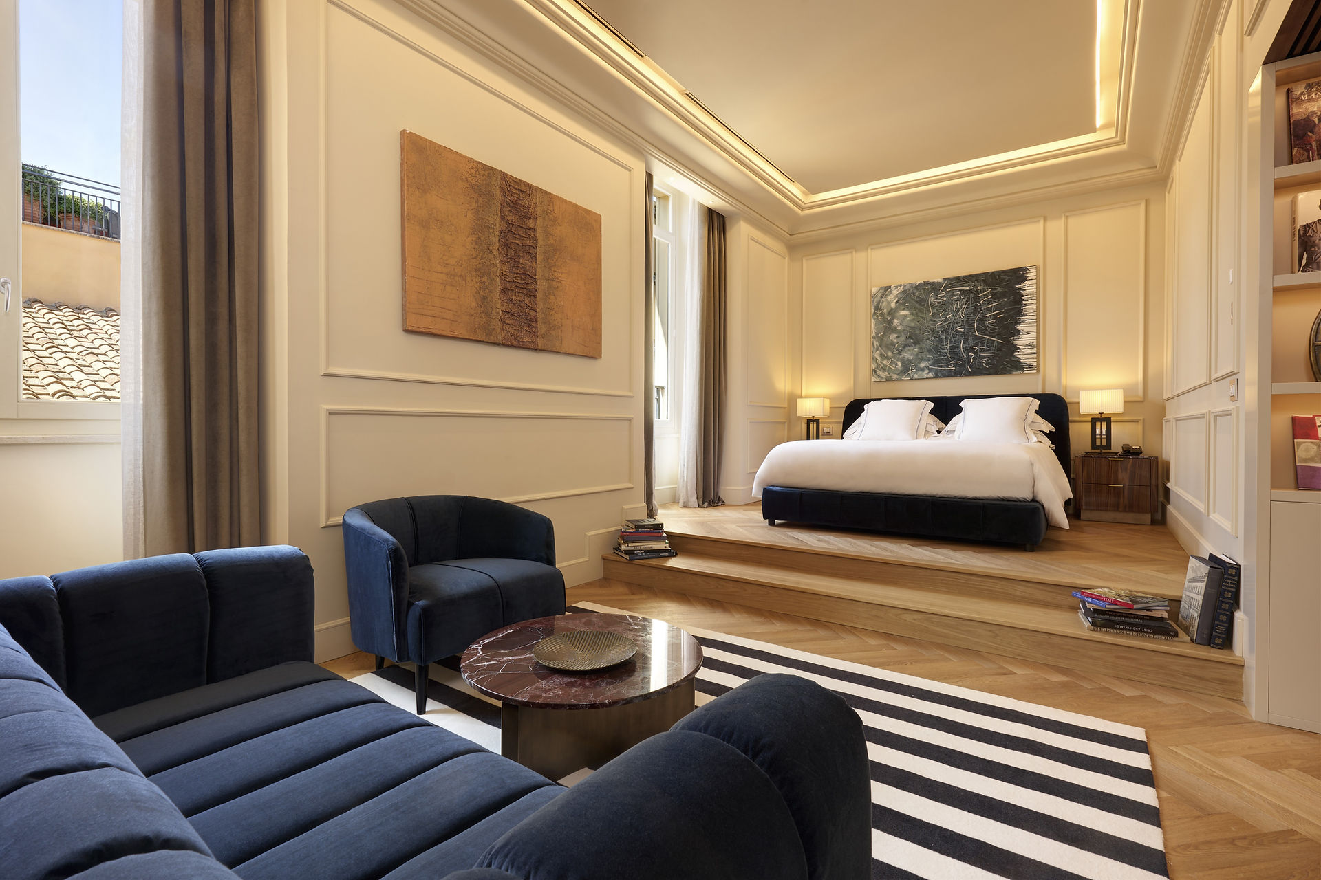Luxury hotel suite: spacious bedroom, plush seating