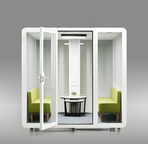 Front-facing view of HexPod Pro 8-person meeting booth with open glass door.
