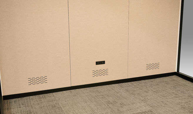 Close-up of the internal power panel on a wood-finish interior wall.