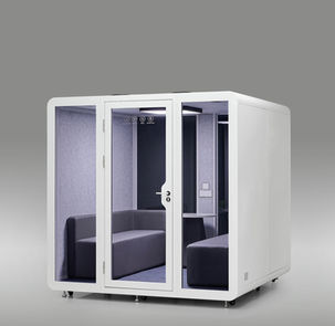 Side-angle view of HexPod Pro showing white exterior panels with tinted glass,.