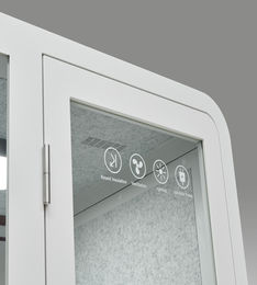 Close up of the top of the door frame and acoustic rating icons.