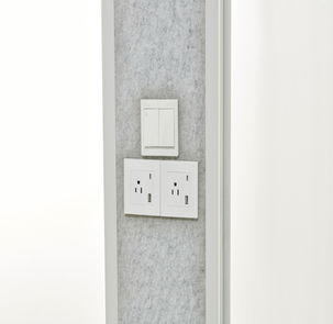 Detail of HexPod Pro universal power strip and cable management port.