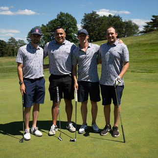 Four golfers posing together on a golf course, 2021 Chip In Fore Youth, BGCCA.