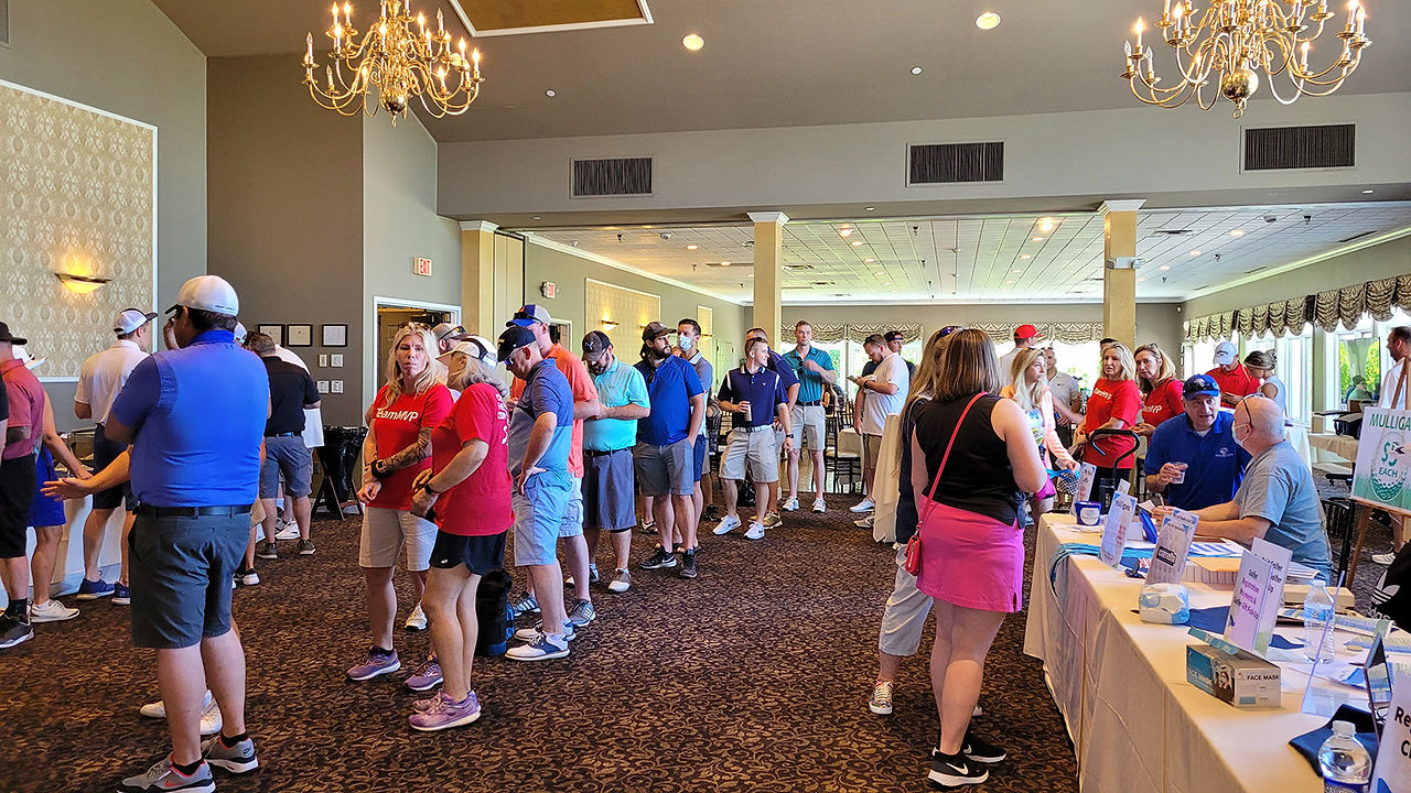 Large group of people standing in line at event BGCCA