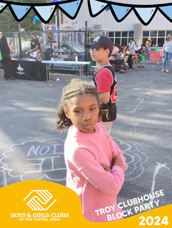 Girl with arms crossed and boy in the background. NOT, Clubhouse, BGCCA.
