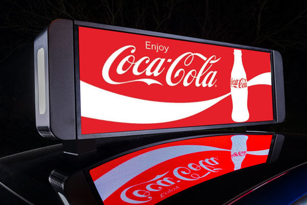 LED taxi top display mounted on car roof, close-up.