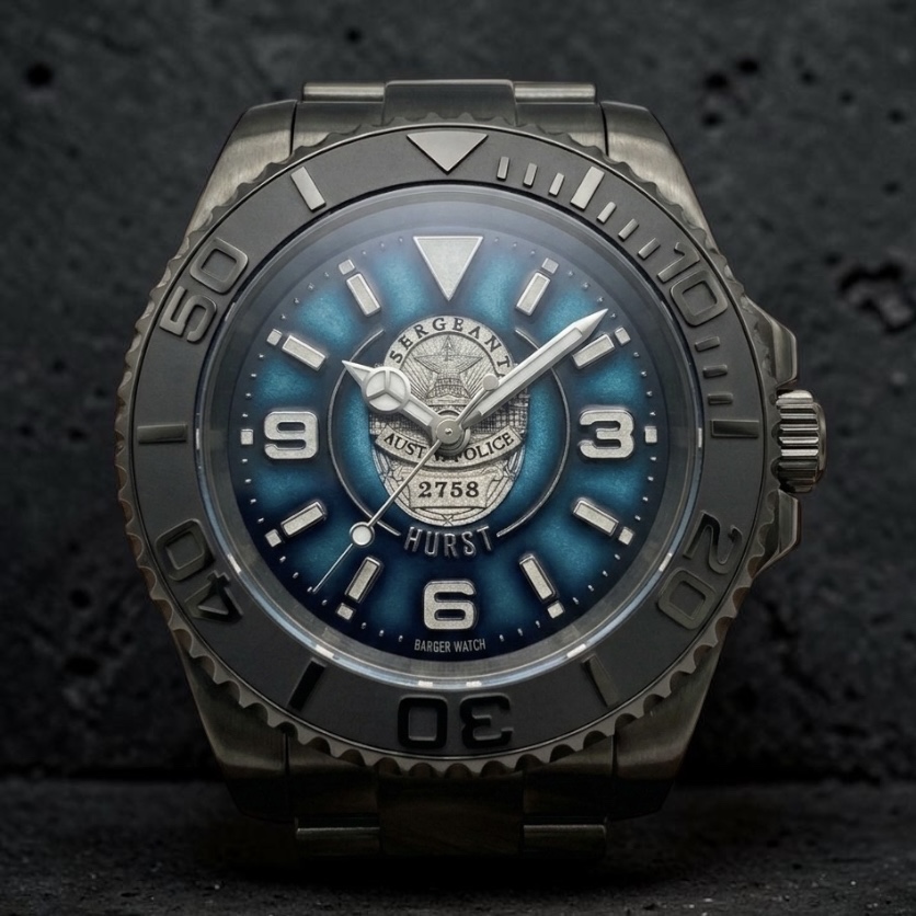 Finished custom watch with a blue dial and an engraved Austin Police badge.