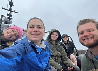 Author on boat with Boston Climate Conservation Corps