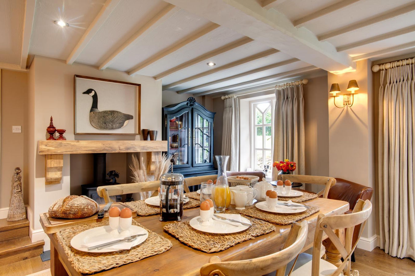 Mill Barn - Dining room with log burner and wood mantle