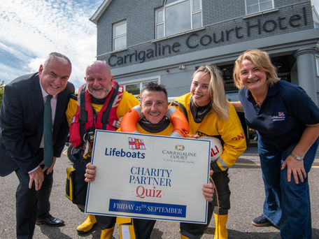 CARRIGALINE COURT ROWS IN BEHIND THE RNLI