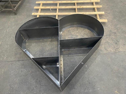Corten heart large log store storage