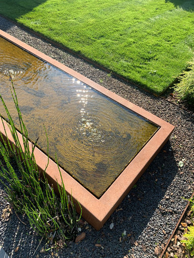 Corten garden architecture Koi carp pond