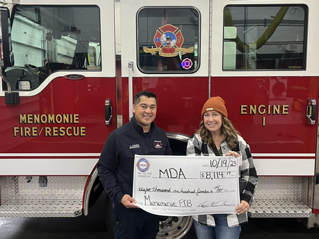 Menomonie Fire Department and MPFU donate proceeds from Fill the Boot Event