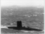 The Churchill class nuclear submarine HMS CONQUEROR with HMS ANTRIM (left) and HMS PLYMOUTH (right) during the transfer of an SBS party from the submarine to PLYMOUTH on 26 April 1982.