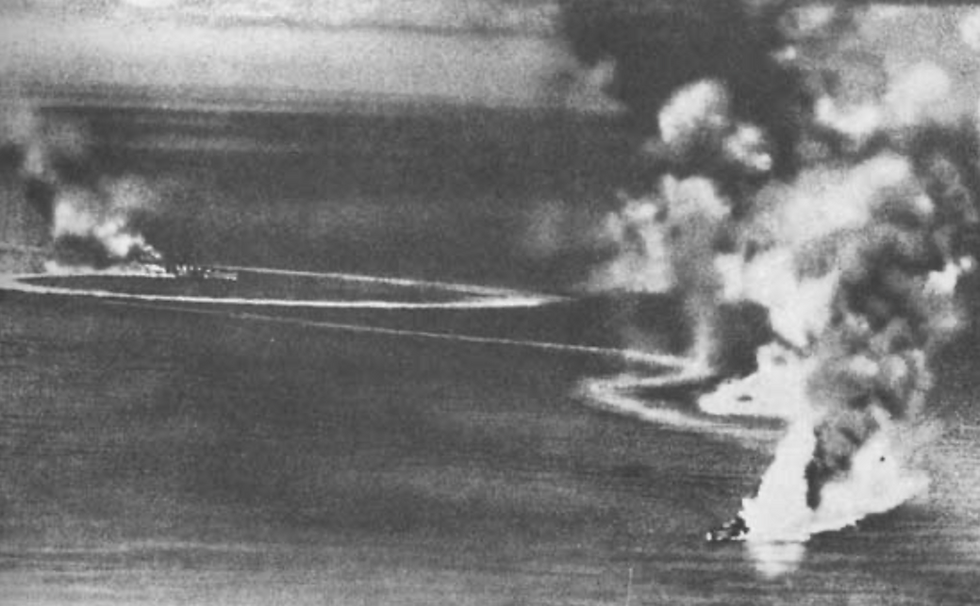 Dorsetshire (background) and Cornwall under air attack by Japanese aircraft, 5 April 1942