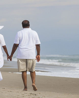Couple at the Beach Walking hand in hand