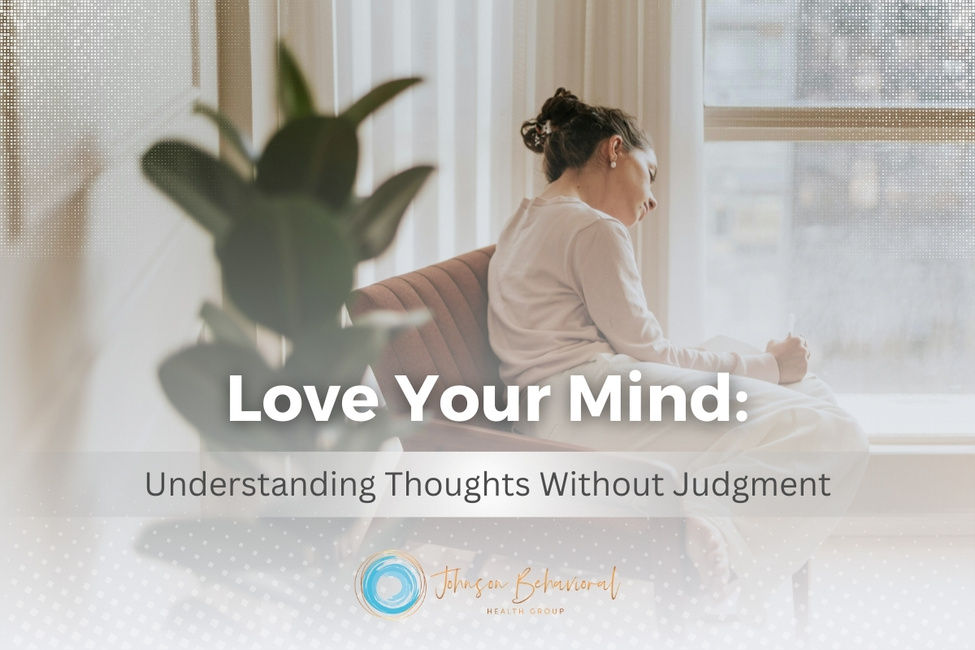 Woman in a cozy room sitting on a brown chair, writing in a notebook by a sunlit window, plant in foreground. Serene atmosphere.