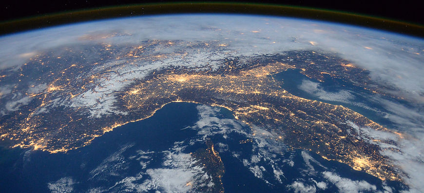 Satellite view of Italy with luminous city lights 