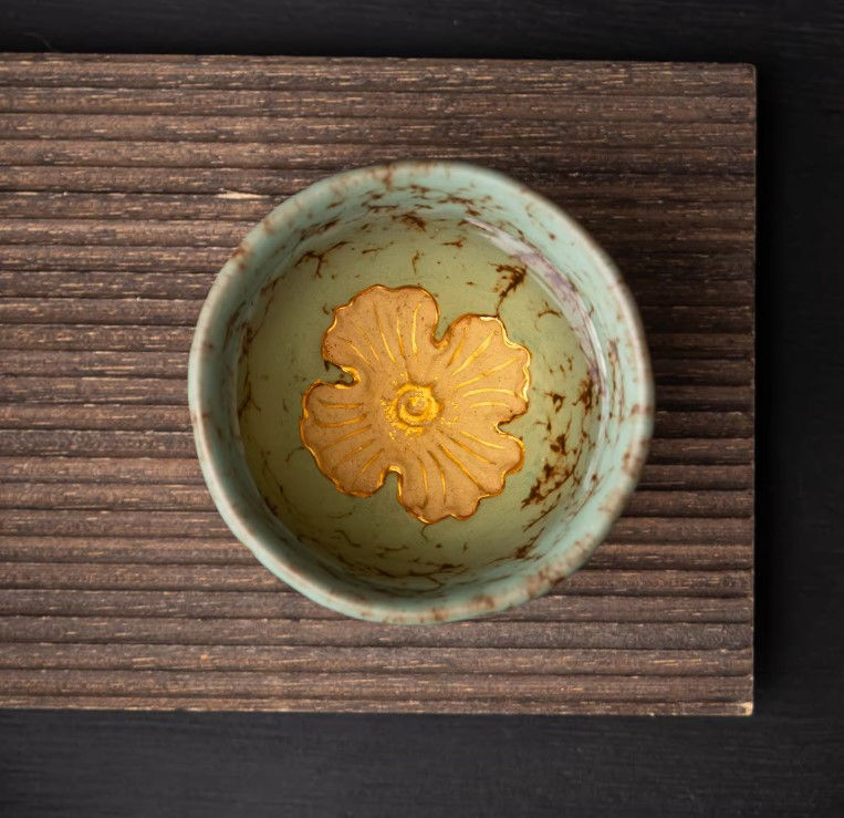 Thumbnail: Handcrafted Artisan Gold Lotus Motifs Green Ceramic Teacup