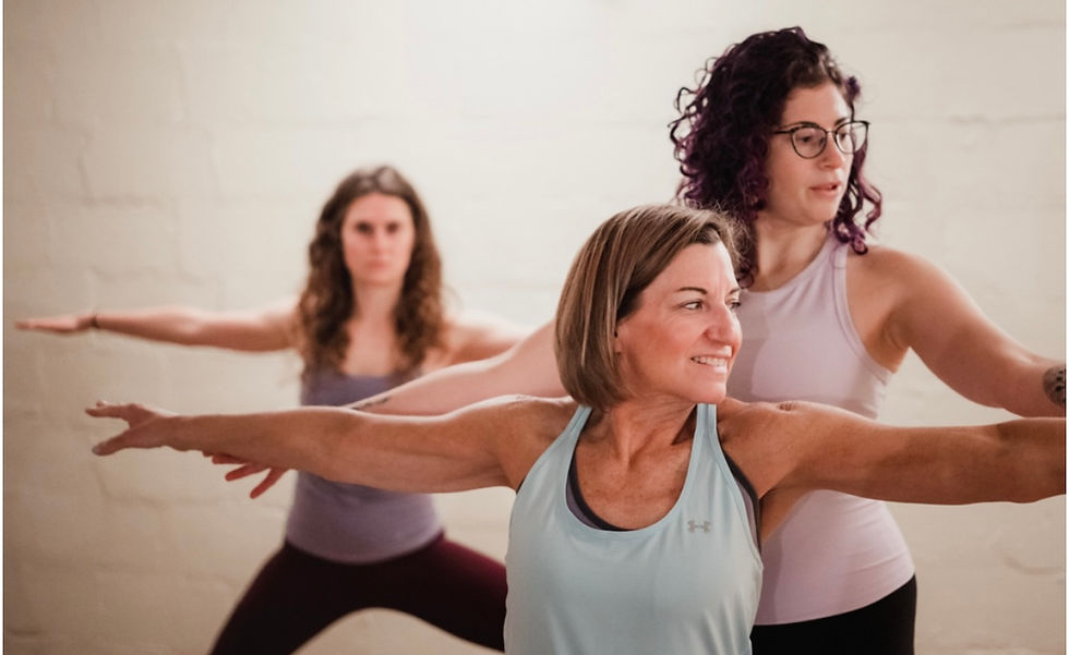 Heidi Kassner teaching students at the yoga barn