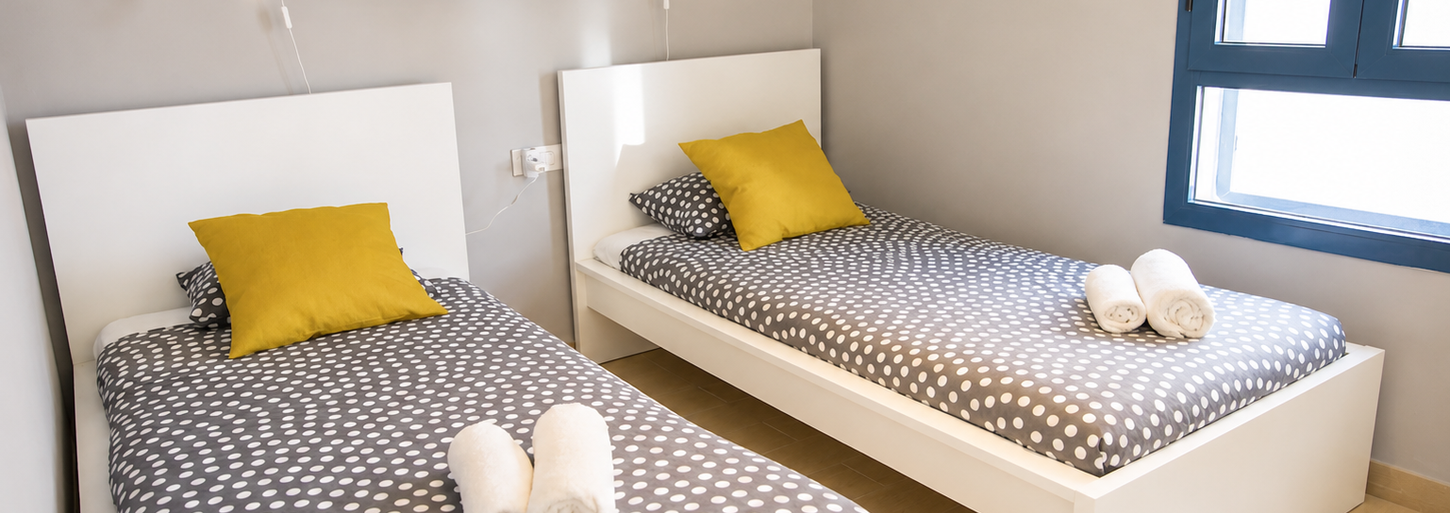 Bright living area at Los Charcos apartment in the centre of Costa Teguise, a five-minute walk from Las Cucharas Beach, restaurants and shops in Lanzarote.