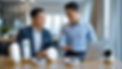 an asian technical sales engineer engaged in a presentation to a customer, equipped with a