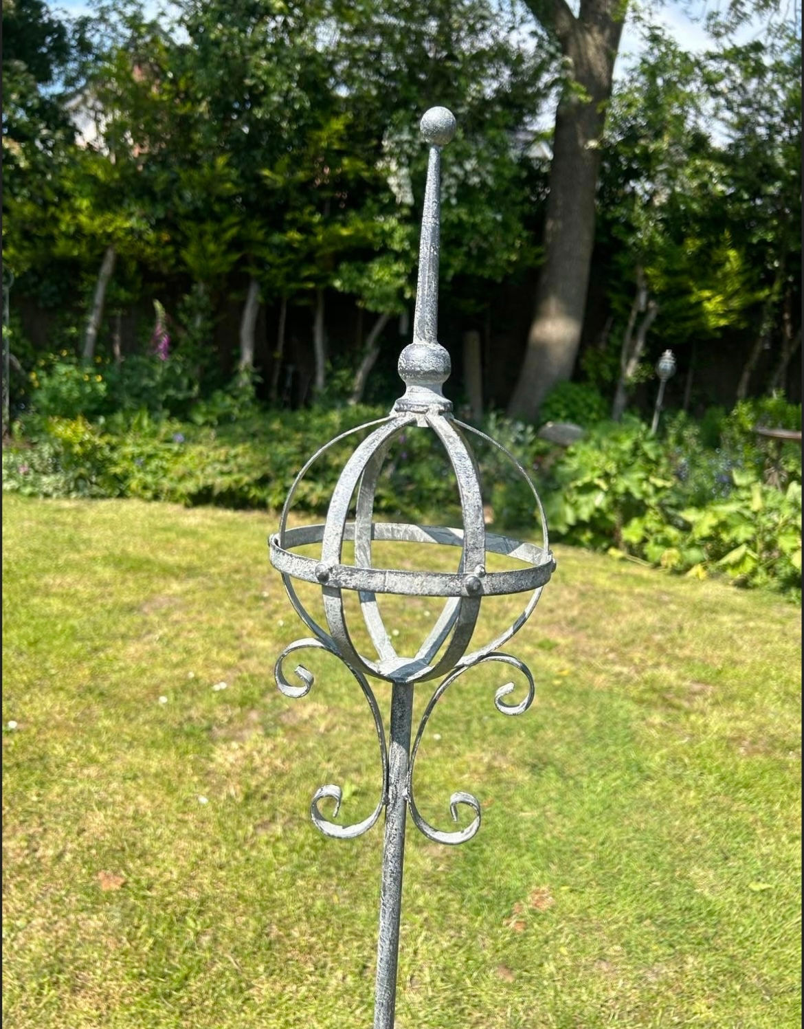 Grey Armillary On Stake