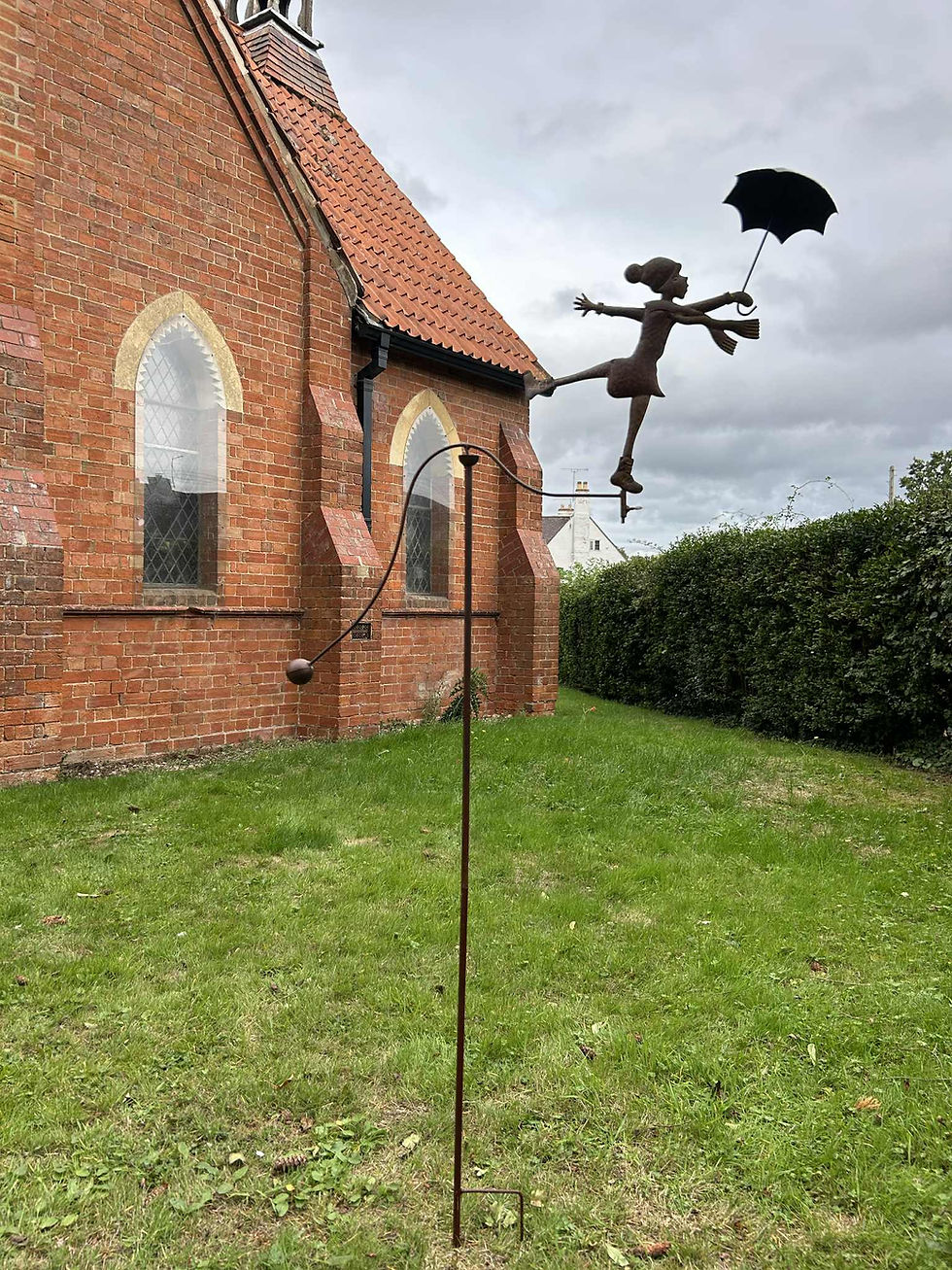 Thumbnail: Upright Lady Wind Spinner