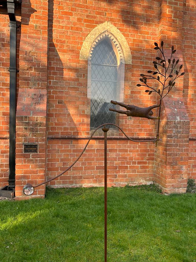 Thumbnail: Man Hanging onto Tree Wind Spinner