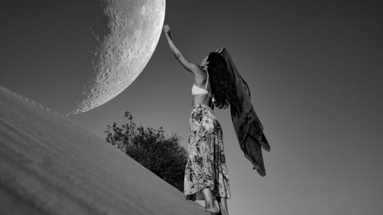 Image of woman and the moon black and white.jpeg