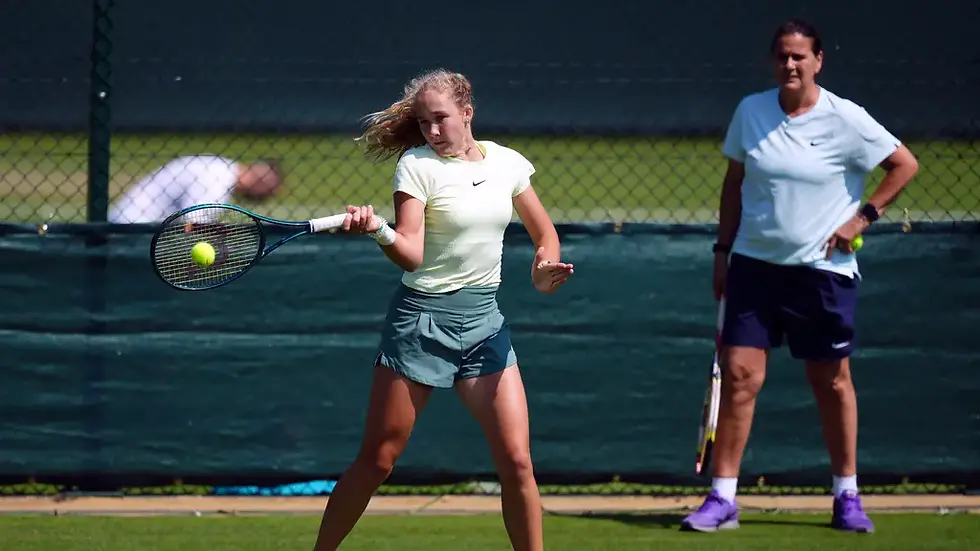 Mirra Andreeva practises under the eye of coach Conchita Martinez (Source: John Walton/PA)