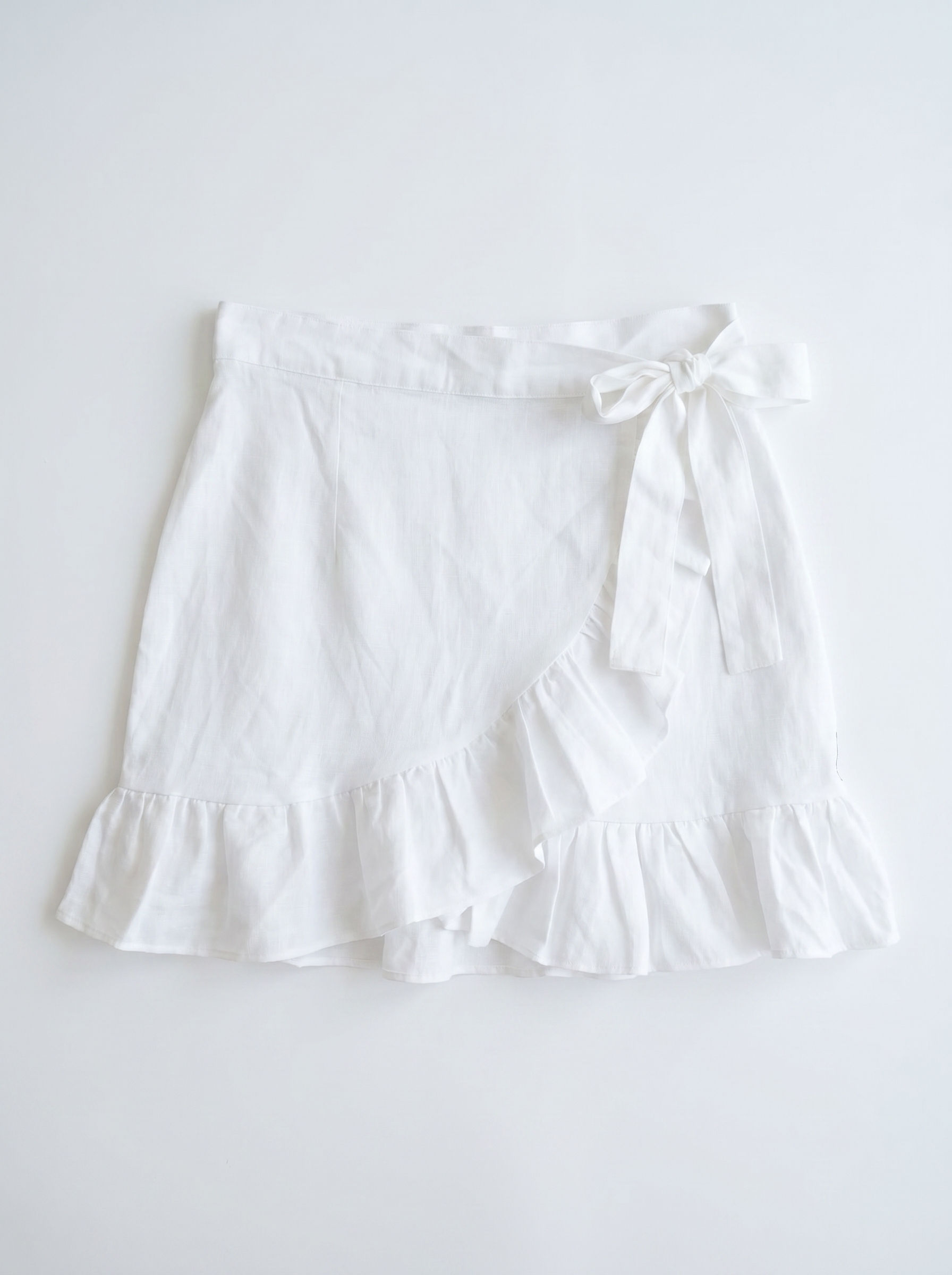 Fácil Blanco Dubai Lucya Linen Wrap Mini Skirt | S