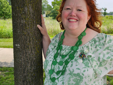 Jessica Gosnell, co-founder of Embracing Your History, smiling in a professional headshot
