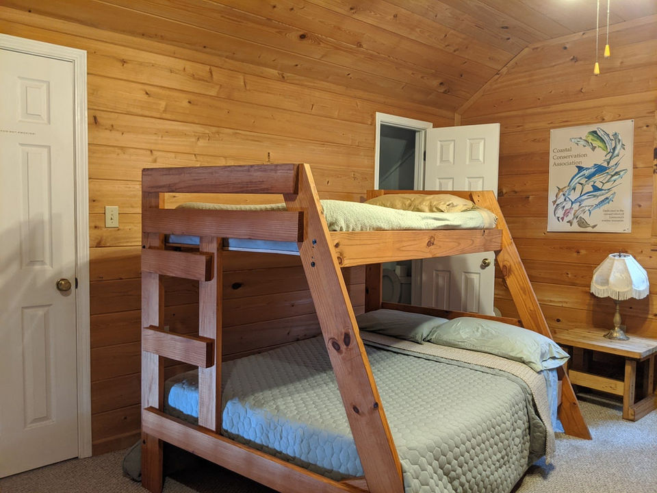 Twin over full bunk beds sleeping area at Pelican's View Lodge fishing camp, Cocodrie Louisiana