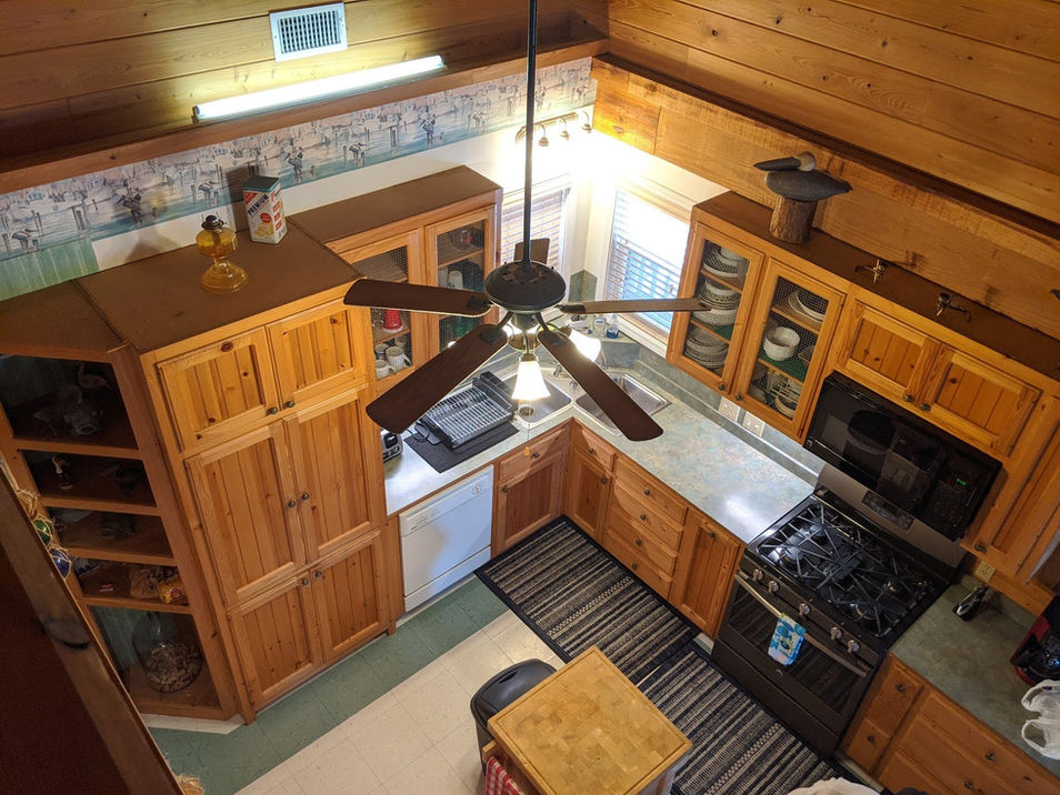 Full kitchen and dining area at Pelican's View Lodge fishing camp rental, Cocodrie Louisiana
