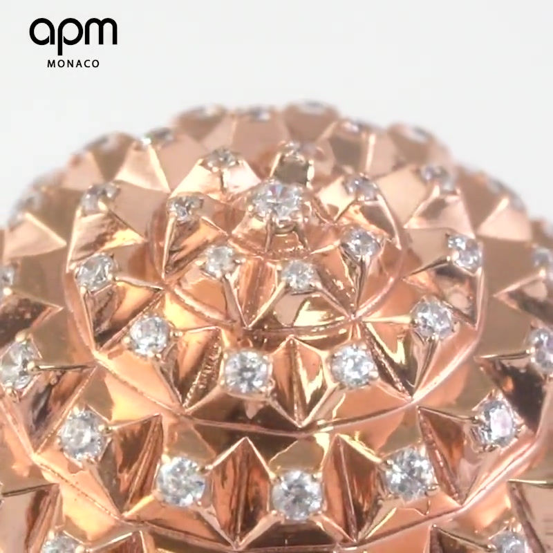 Thumbnail: APM Monaco big Rose Gold Hedgehog ring designed by Bastien Carsana, featuring white spinels.