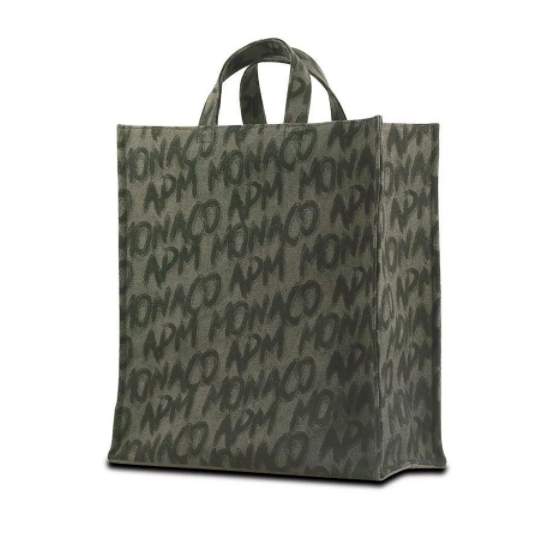 APM Monaco oversized dark green canvas tote bag designed by Bastien Carsana, with black graffiti patterns.