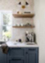 coffee bar with blue cabinets