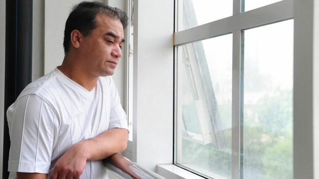 University economics professor Ilham Tohti, who was charged with promoting ethnic separatism and was handed a life sentence by a Chinese court on Sept. 23, 2014, in a file photo.