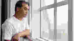 University economics professor Ilham Tohti, who was charged with promoting ethnic separatism and was handed a life sentence by a Chinese court on Sept. 23, 2014, in a file photo.