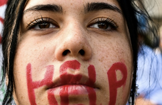 Petition Penned by Academics Urges President Biden to Support Iranian Student Protestors